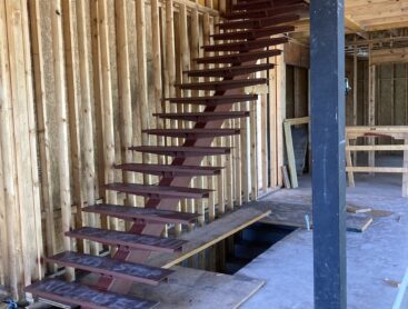 Considerations for Adding Customized Metal Stairs in Your House or Business